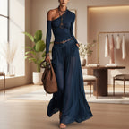 Asymmetrical shoulder long sleeve belted A-line maxi dress by FitiqueFit displayed on a mannequin.