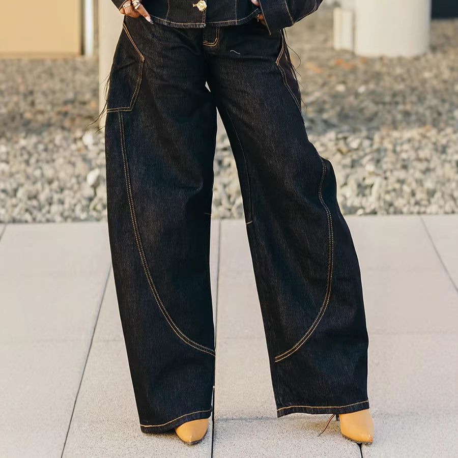 Eprolo curved hem stitched denim jeans showing a close-up of the stylish stitched hem and classic blue denim fabric.