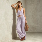 Women's V-neck sleeveless camisole top and wide-leg pants set by FitiqueFit, shown in a stylish matching ensemble.