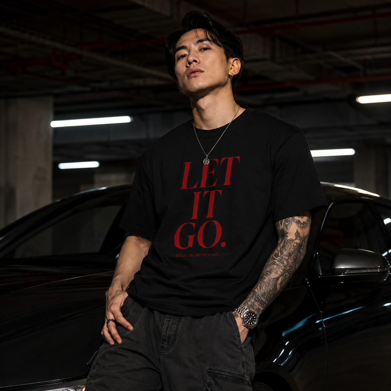 Let It Go T-Shirt from Plush Fashion Hub's SEEN Unmasked Collection, featuring a casual black T-shirt with graphic print.