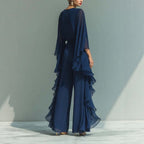 Deep blue ruffle wide-leg pants set by FitiqueFit featuring a matching top with batwing sleeves, stylish and elegant women's two-piece outfit.