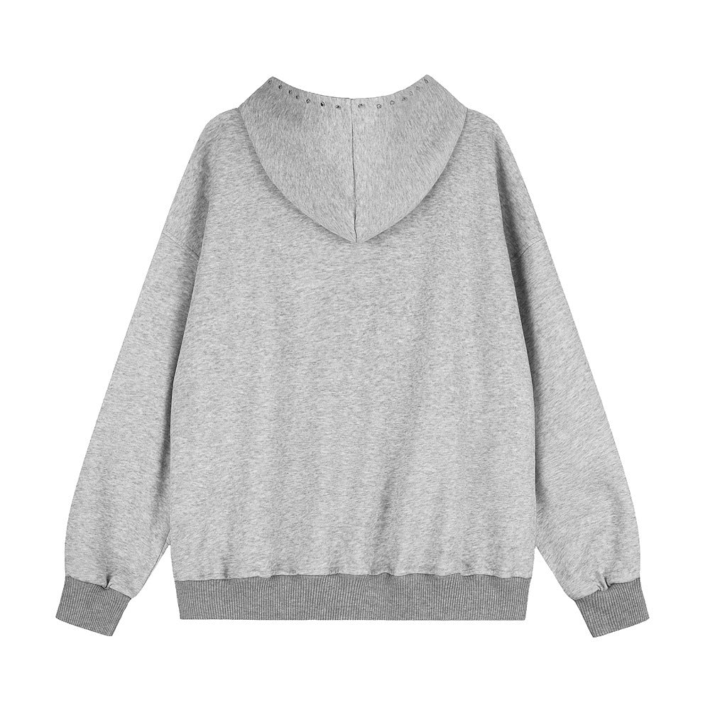 Back of grey heather cotton-blend hoodie with studded hood edge and ribbed cuffs.