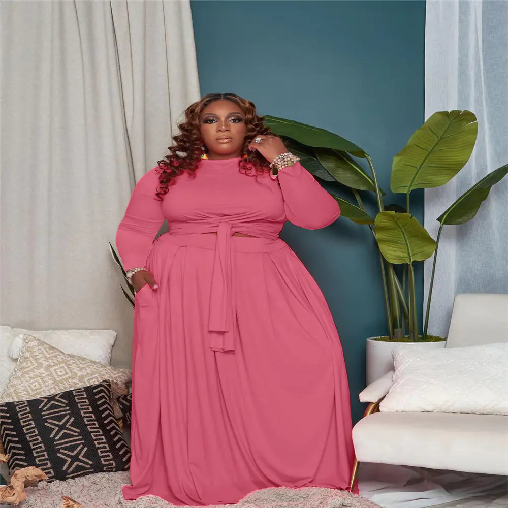 Plus size women's sexy two-piece skirt set with long sleeves, stylish and fitted for a trendy plus size women’s outfit.