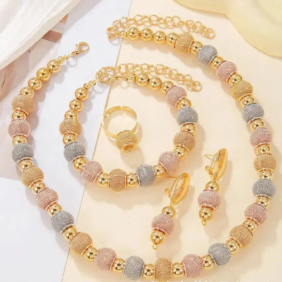 Contrast large round bead jewelry set featuring a statement necklace and matching earrings by Plush Fashion Hub.