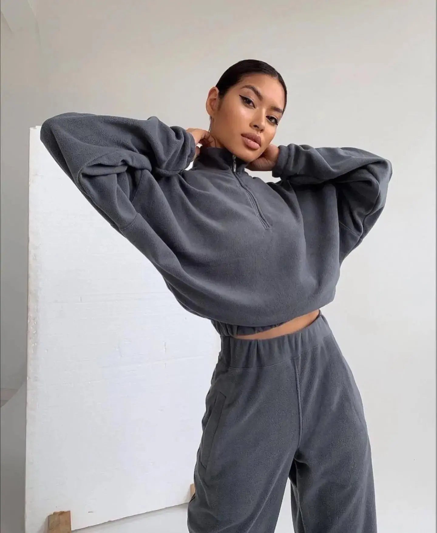 Women's high collar fleece sweatsuit by Plush Fashion Hub featuring a cozy two-piece lounge set with a stylish high collar fleece sweater.