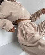 Women’s high collar fleece sweatsuit by Plush Fashion Hub, cozy two-piece lounge set with a stylish high collar fleece sweater.