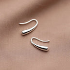 Elegant minimalist drop earrings in lightweight sterling silver, featuring simple and stylish design for women's jewelry.