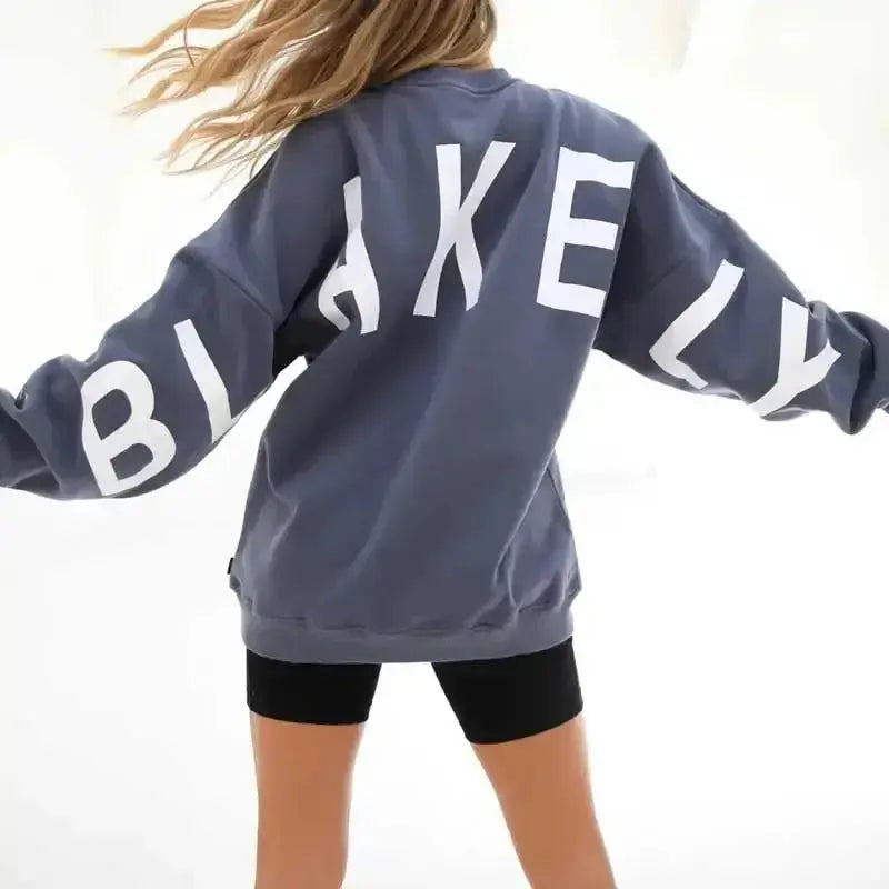 Oversized graphic print long sleeve sweatshirt from Plush Fashion Hub featuring a cozy urban style and thick, loose fit.
