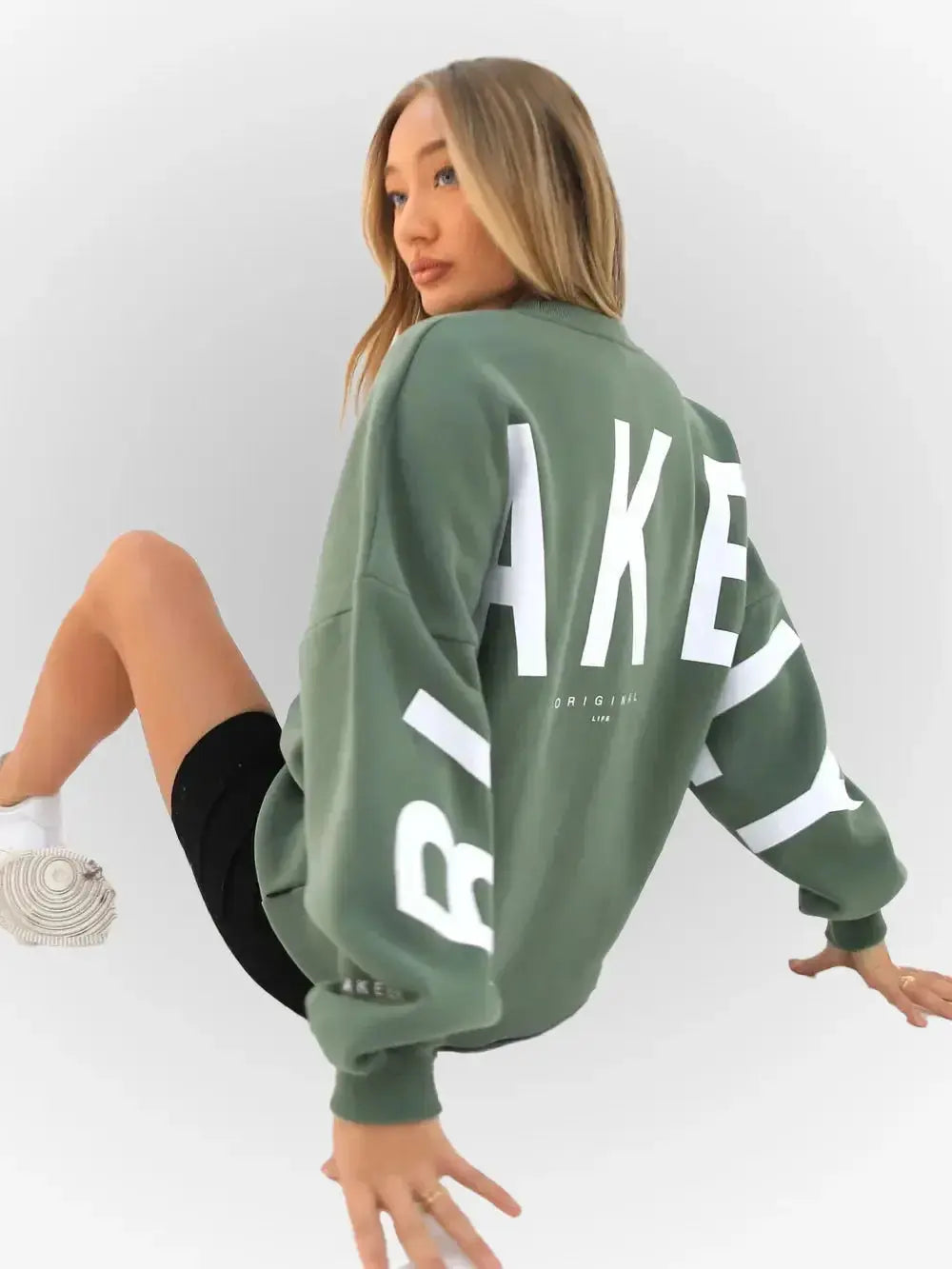 Oversized graphic print long sleeve sweatshirt by Plush Fashion Hub, featuring a cozy, thick, and loose urban pullover design.