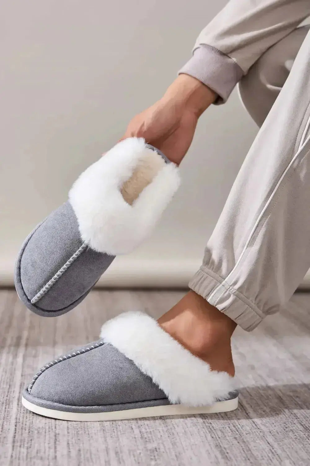 Soft plush faux fur indoor slippers for women with round toes from Plush Fashion Hub, cozy house shoes for comfortable wear.