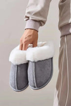 Soft plush faux fur indoor slippers for women with round toes from Plush Fashion Hub, cozy house shoes for comfort at home.