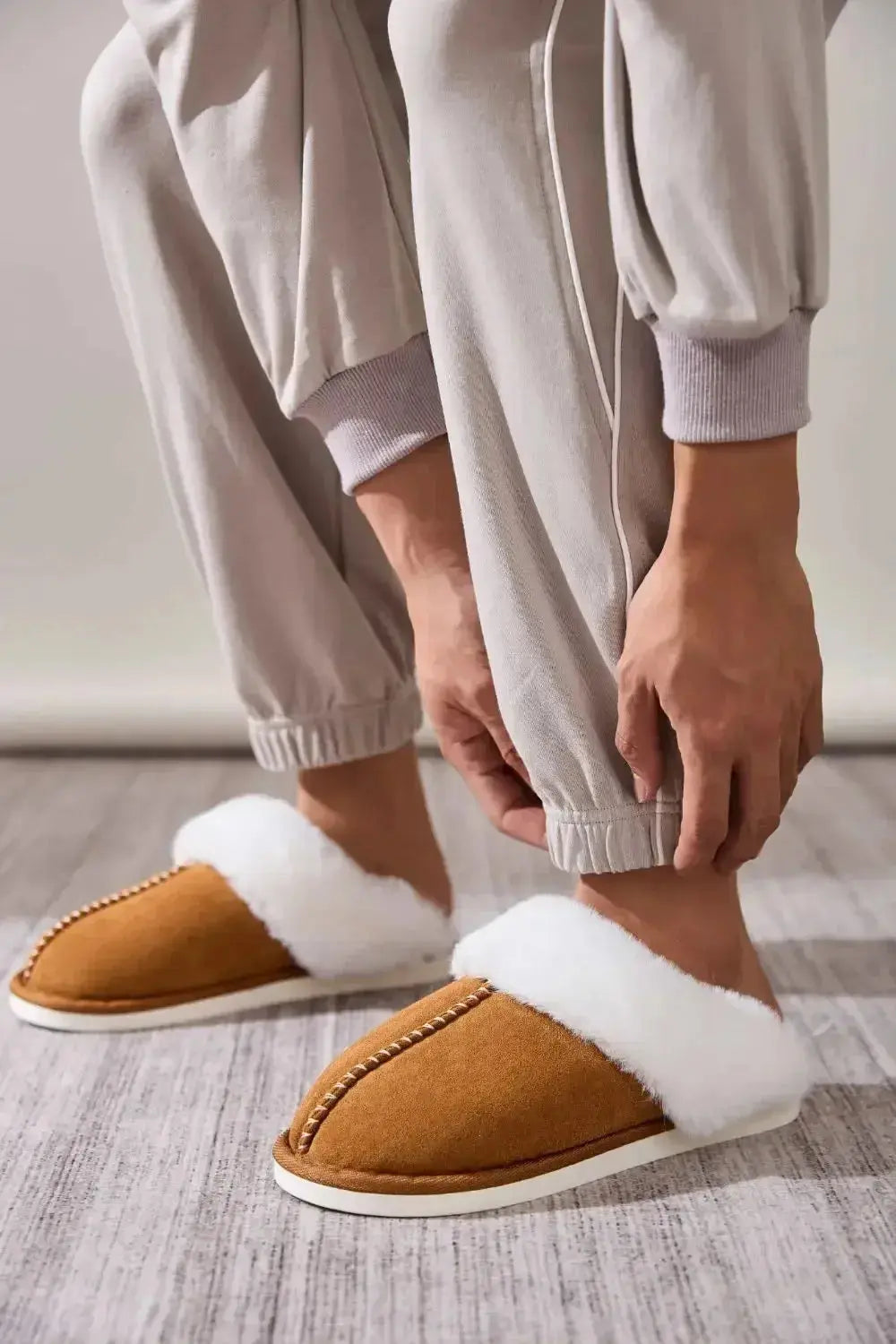 Soft plush faux fur women's indoor slippers with round toes from Plush Fashion Hub, cozy house shoes for comfort.