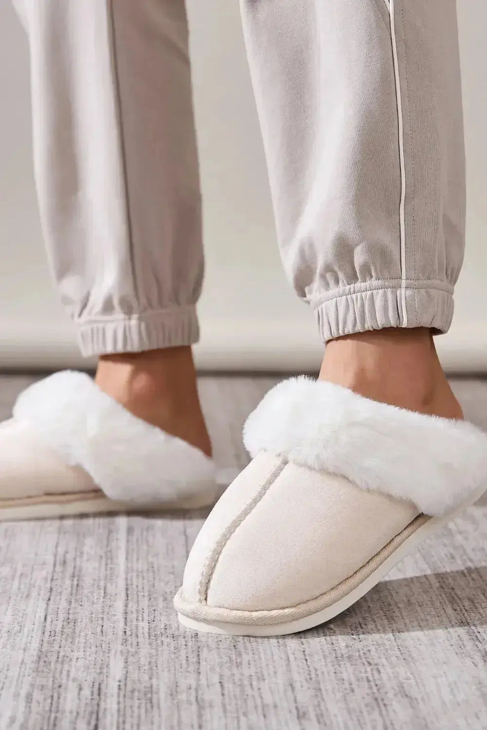 Soft plush faux fur indoor slippers for women with round toes by Plush Fashion Hub, cozy house shoes for comfort at home.