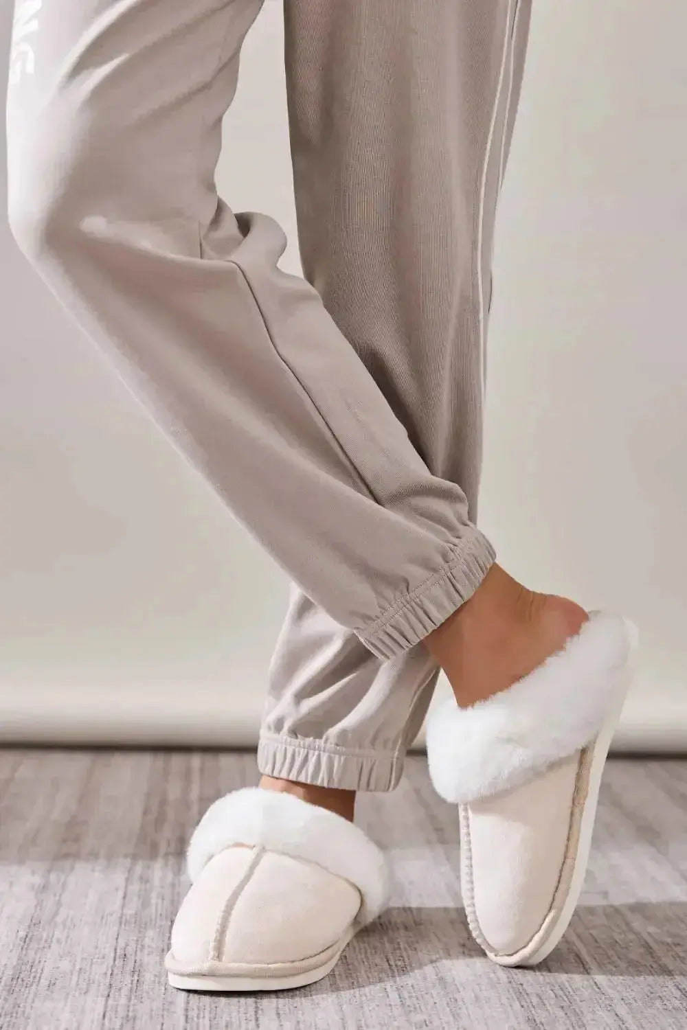 Soft plush faux fur indoor slippers for women with round toe design, made by Plush Fashion Hub, cozy house shoes for home.
