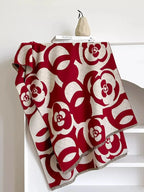 Floral patterned winter scarf from Plush Fashion Hub, showcasing soft cozy fabric perfect for autumn and winter accessories.