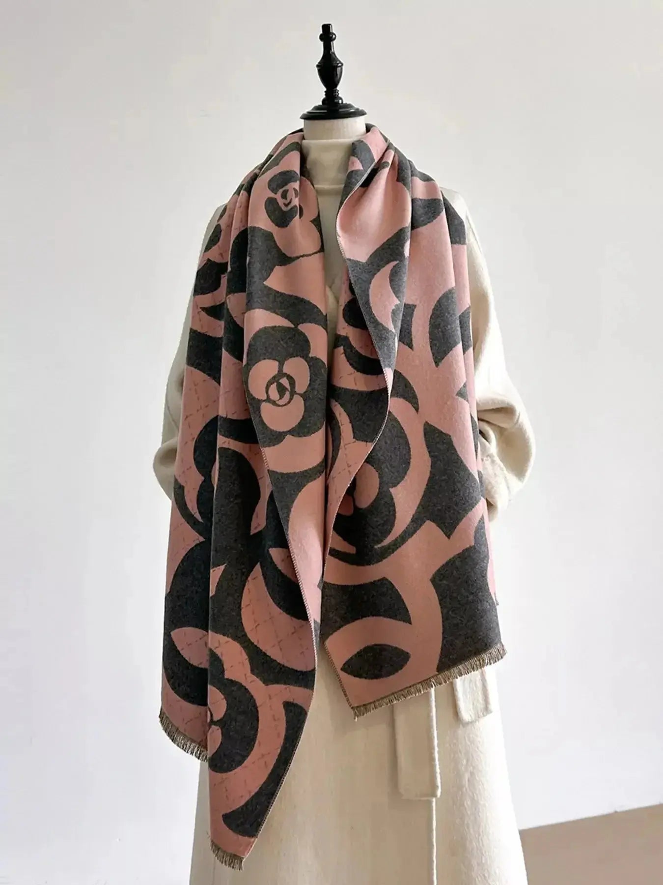 Floral patterned winter scarf from Plush Fashion Hub, soft cozy warm accessory for autumn and winter wear.