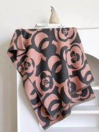 Floral patterned winter scarf by Plush Fashion Hub, soft cozy accessory providing warmth for autumn and winter.