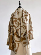 Floral patterned winter scarf from Plush Fashion Hub, soft and cozy accessory for autumn and winter warmth.