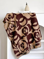 Floral patterned winter scarf from Plush Fashion Hub, soft and warm accessories ideal for autumn and winter wear.