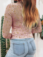 Floral print long sleeve sheer mesh blouse by Plush Fashion Hub, feminine layering top with delicate floral pattern and lightweight fabric.