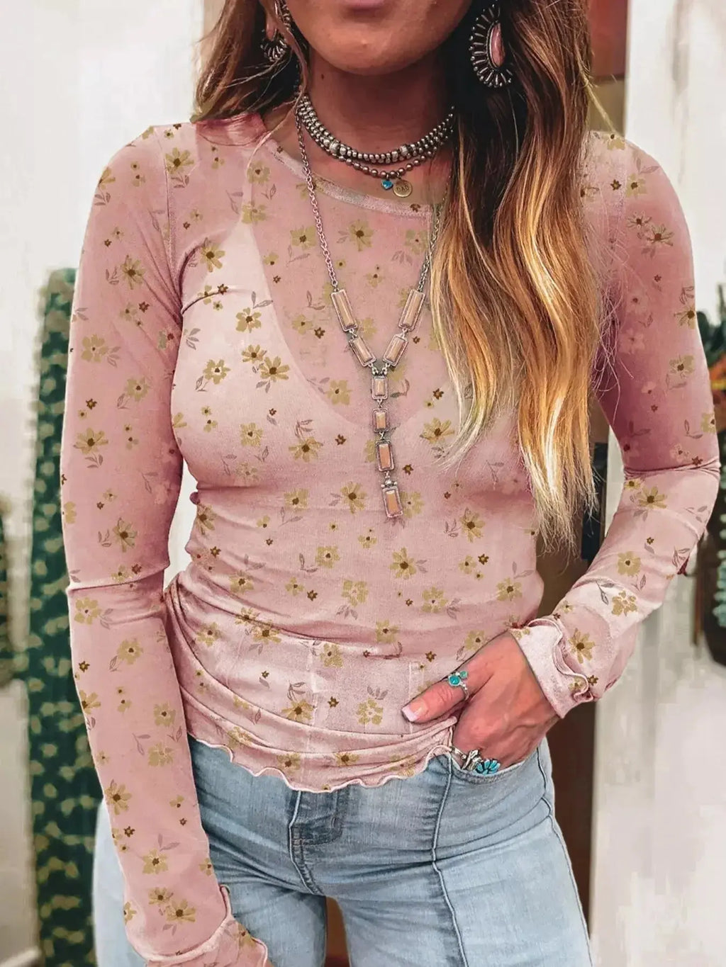 Floral print long sleeve sheer mesh blouse by Plush Fashion Hub, feminine layering top with vibrant floral design and lightweight fabric.