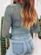 Floral print long sleeve sheer mesh blouse by Plush Fashion Hub, feminine layering top with lightweight, flowy fabric.