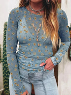 Floral print long sleeve sheer mesh blouse by Plush Fashion Hub, feminine layering top with delicate floral patterns.