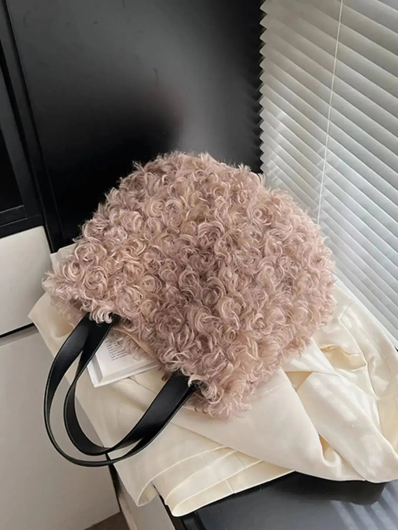 Soft faux fur fluffy shoulder bag by Trendsi, lightweight plush handbag with a stylish, cozy design for everyday use.