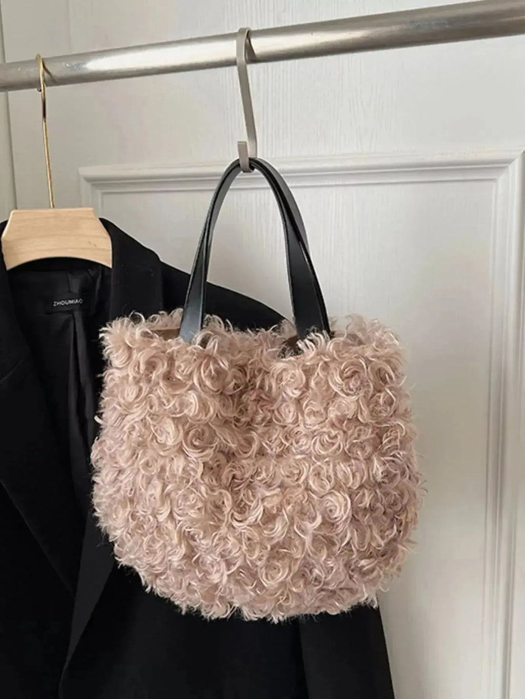 Lightweight plush faux fur shoulder handbag with soft, fluffy texture from Trendsi, perfect for stylish casual wear.