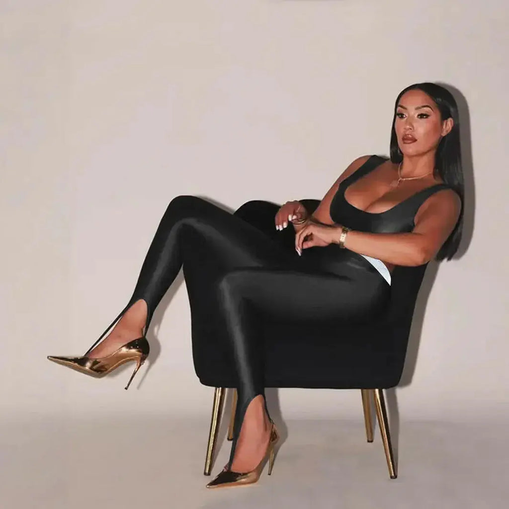 Shiny black front step leggings by Plush Fashion Hub featuring high-gloss, premium stretch skinny pants with a sleek fit.