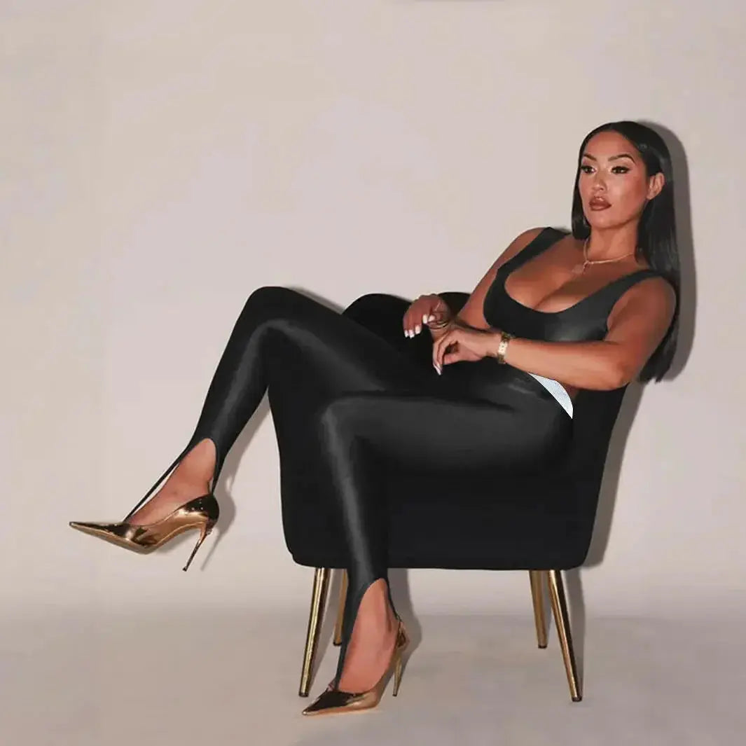 Shiny black front step leggings by Plush Fashion Hub featuring high-gloss, premium stretch skinny pants with a sleek fit.