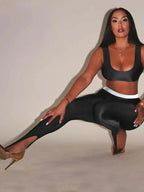 Shiny front step high-gloss leggings by Plush Fashion Hub, premium stretch skinny pants with a sleek, reflective finish.