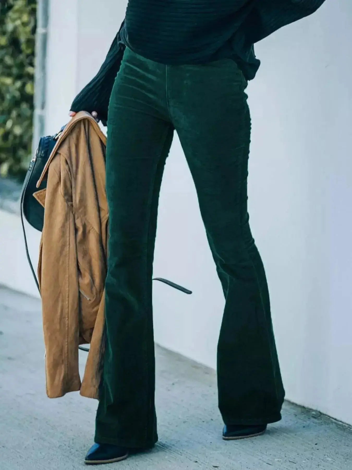 Plus size women's corduroy flare pants by Plush Fashion Hub featuring high-waisted boho style and wide-leg design.