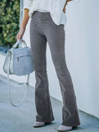 Plus size women's high-waisted corduroy flare pants by Plush Fashion Hub, boho style trousers shown full length.