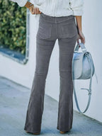 Plus size women's corduroy flare pants by Plush Fashion Hub, high-waisted boho trousers with a full-length fit.