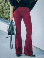 Plus size women's corduroy flare pants by Plush Fashion Hub, high-waisted boho trousers with wide-leg style.