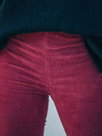 Plus size women's corduroy flare pants by Plush Fashion Hub, high-waisted boho trousers, full-length view.