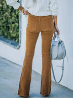 Plus size women's corduroy flare pants by Plush Fashion Hub, high-waisted boho trousers with wide legs and comfortable fit.