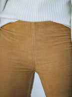 Plus size women's corduroy flare pants by Plush Fashion Hub, high-waisted boho trousers with wide-leg style.