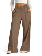 Plus size women's relaxed fit wide-leg drawstring pants by Plush Fashion Hub, comfortable lounge trousers in soft fabric.