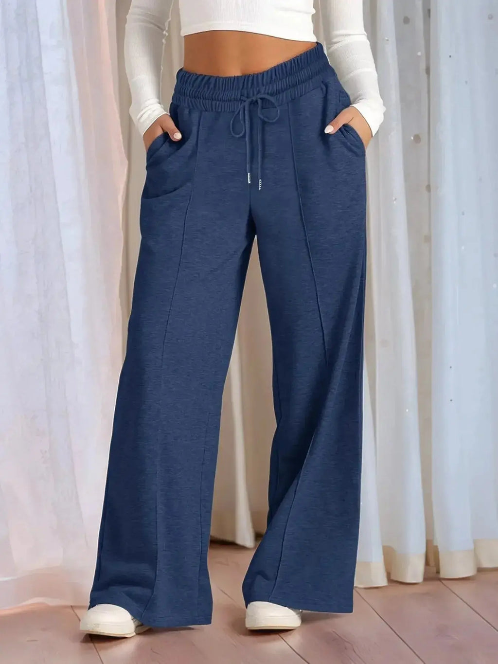 Plus size women's relaxed fit wide leg drawstring pants by Plush Fashion Hub, comfortable lounge trousers in full view.