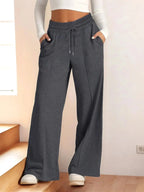 Plus size women's relaxed fit wide-leg lounge pants with drawstring waist from Plush Fashion Hub, comfortable and stylish for casual wear.