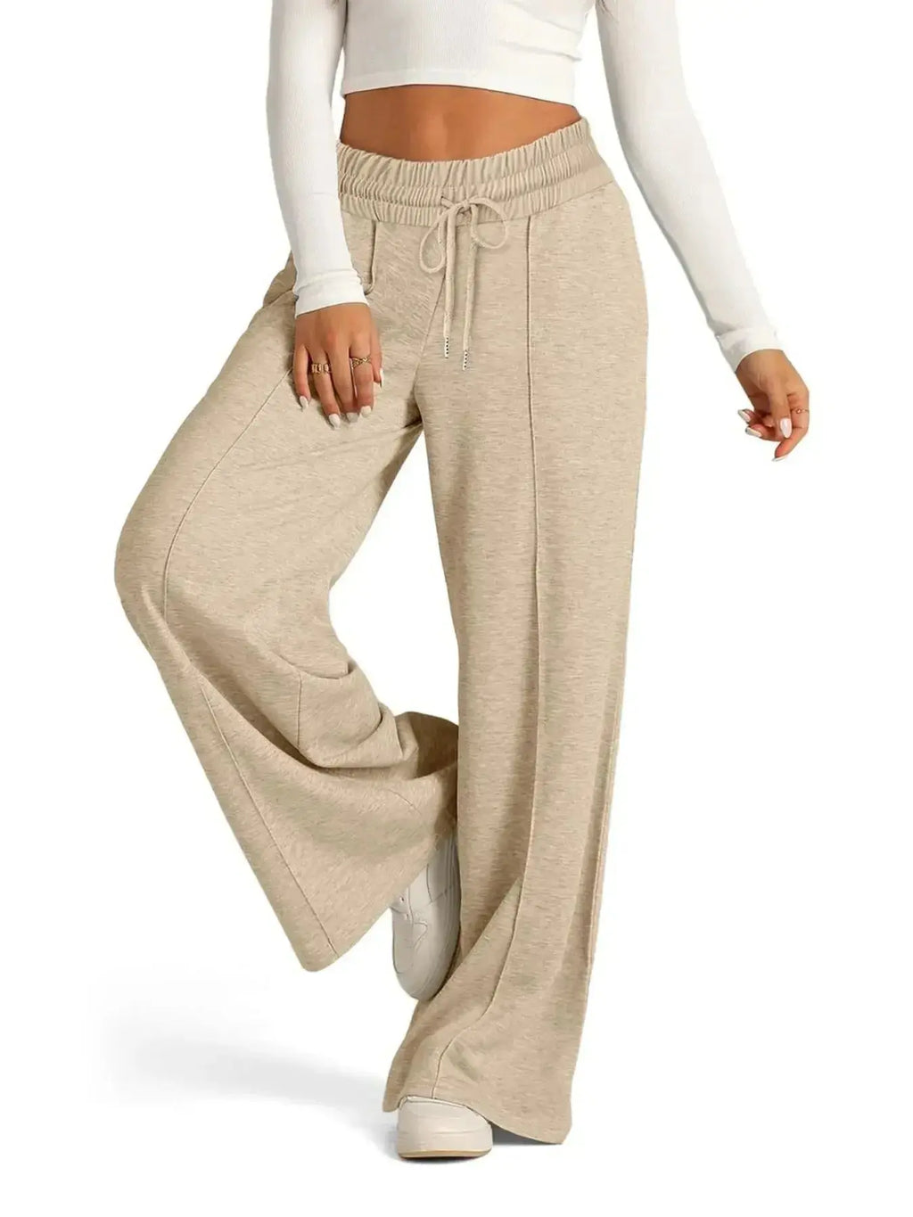 Plus-size women's relaxed fit wide-leg drawstring pants by Plush Fashion Hub, comfortable lounge trousers, full-length view.