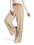 Plus-size women's relaxed fit wide-leg drawstring pants by Plush Fashion Hub, comfortable lounge trousers, full-length view.