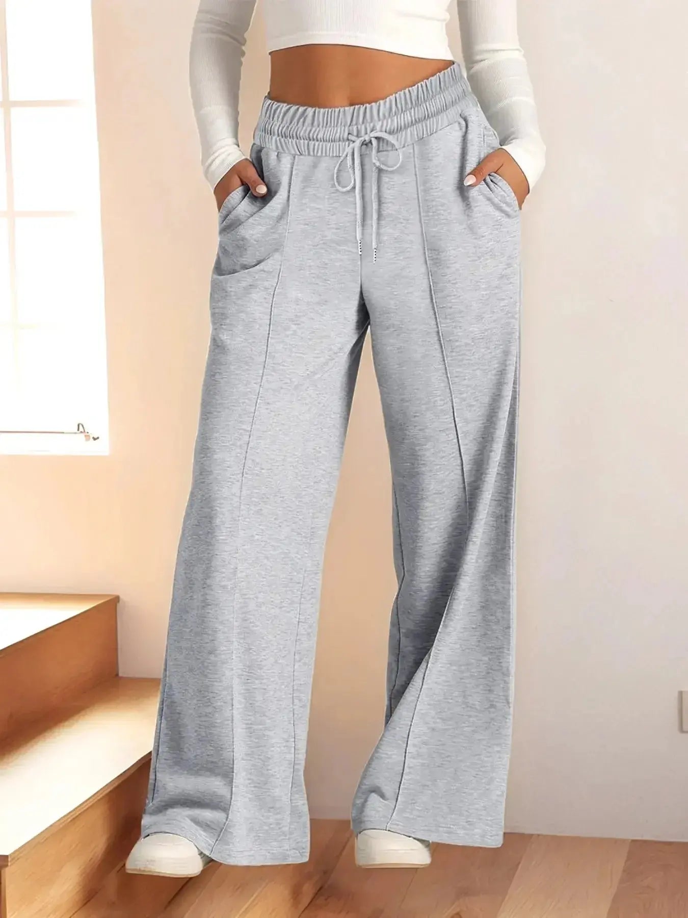 Women's relaxed fit wide-leg drawstring pants by Plush Fashion Hub, full-length lounge trousers in a comfortable, casual style.