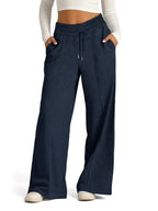 Plus size women's relaxed fit wide-leg drawstring pants by Plush Fashion Hub, comfortable lounge trousers with an elastic waistband.