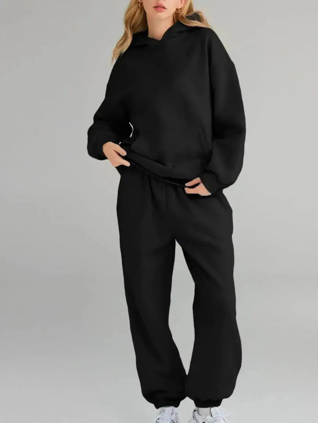 Plus size women's hoodie and jogger sweat set with kangaroo pocket from Plush Fashion Hub, comfortable and casual loungewear.