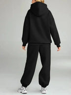 Plus size women's hoodie and jogger sweat suit with kangaroo pocket from Plush Fashion Hub, featuring a cozy, relaxed fit.