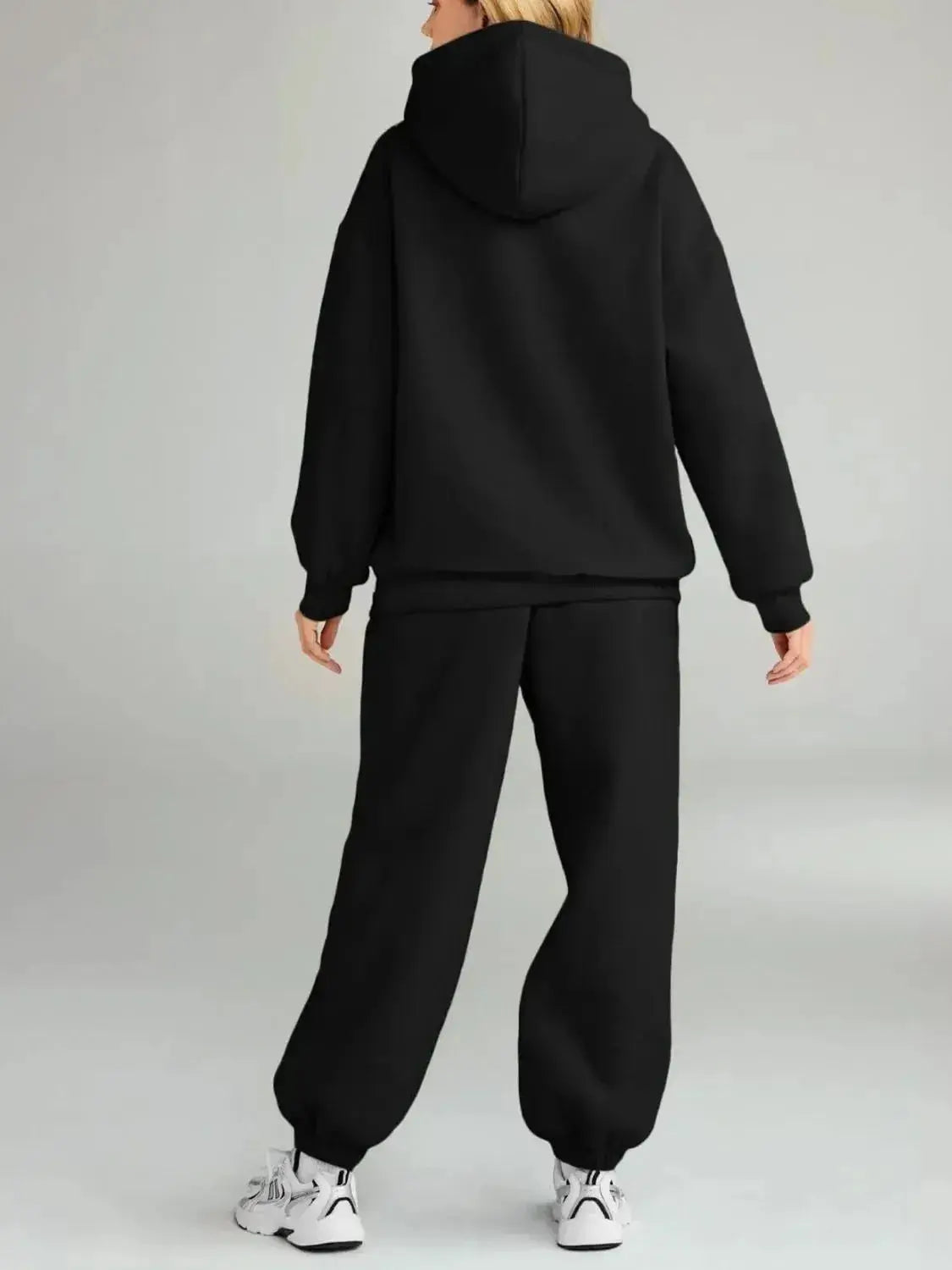 Plus size women's hoodie and jogger sweat suit with kangaroo pocket from Plush Fashion Hub, featuring a cozy, relaxed fit.