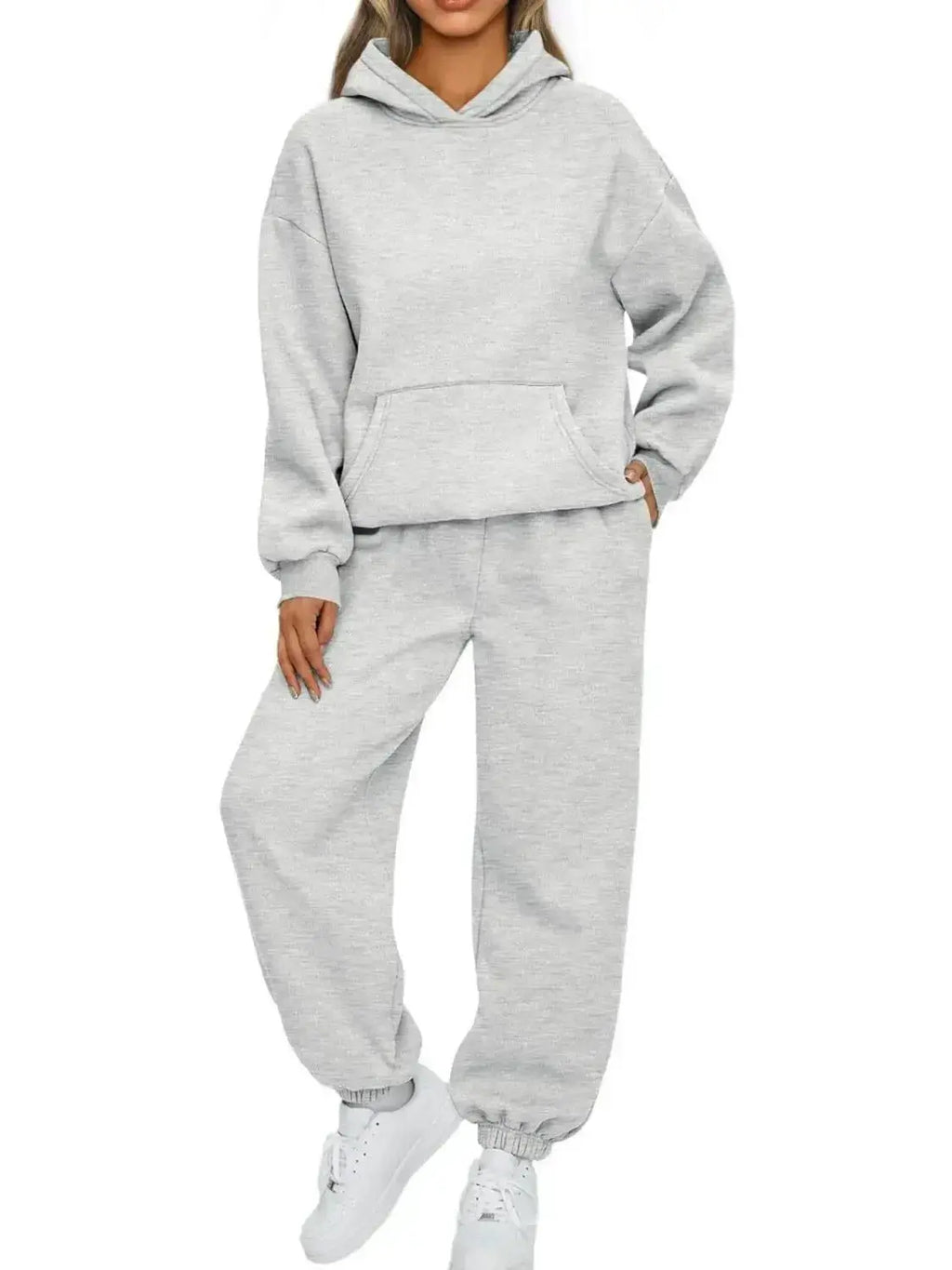 Plus size women's hoodie and jogger sweat suit with kangaroo pocket, by Plush Fashion Hub, shown as a comfortable full-body set.